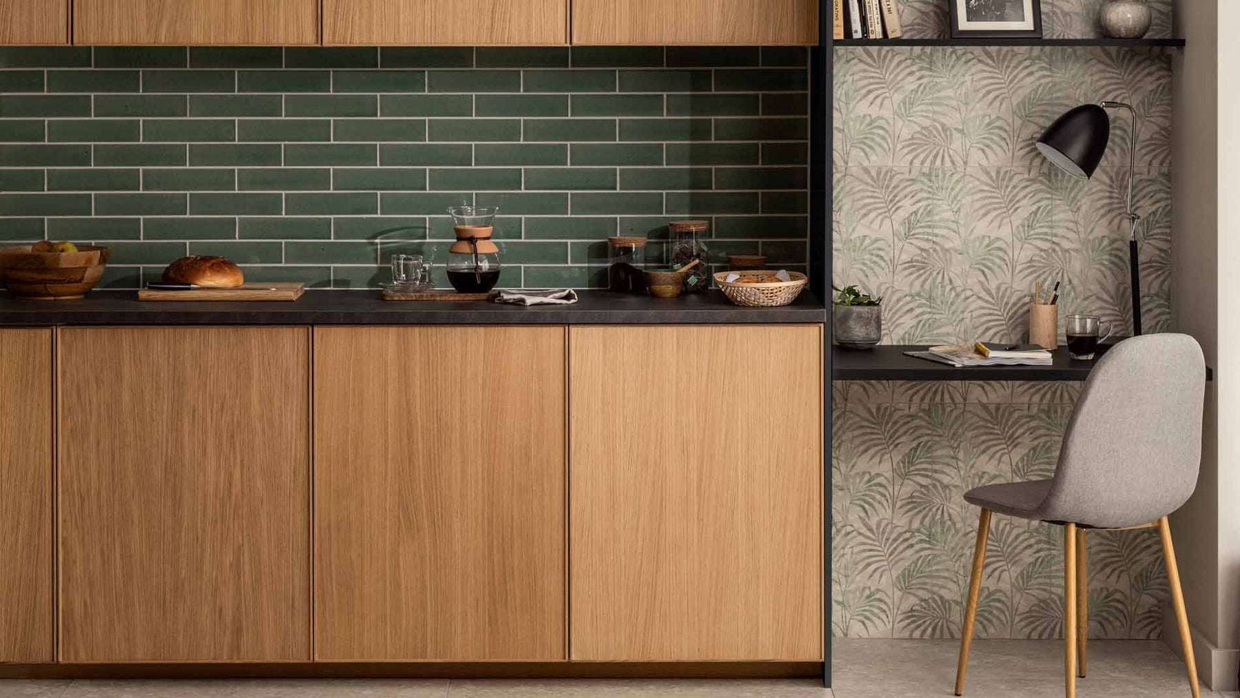 green kitchen tile with wooden cupboards and work space
