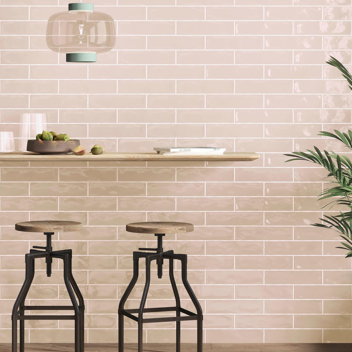 Image of Pink brick wall tiles with a breakfast bar and stools