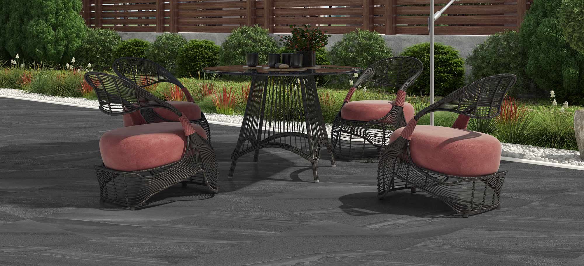 Image of Outdoor Porcelain tile 60x120cm Nexus Anthracite in garden veranda setting with white outdoor furniture and garden