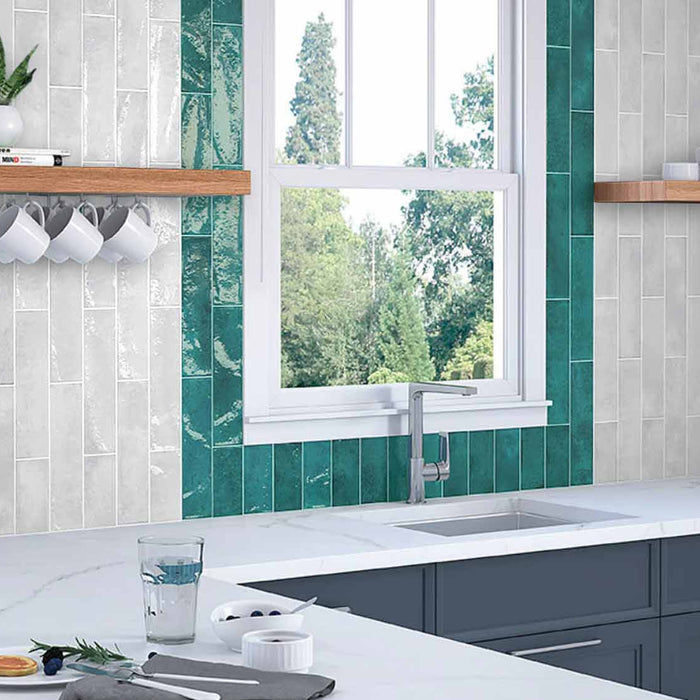 kitchen work top with white and green tile splash back walls