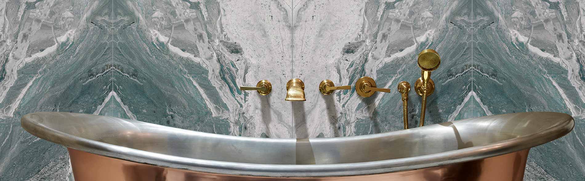 Image of Magnifique Ocean Bookmatched Porcelain Polished tile 60x120cm with a brass free standing bath