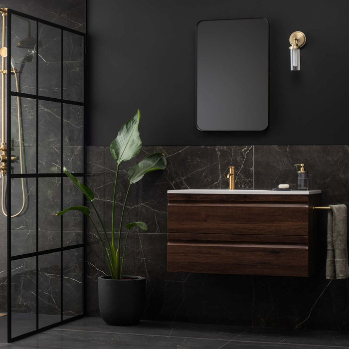 Marmi nero tile used as a wall and floor tile in a bathroom and shower