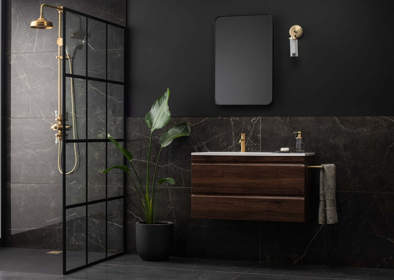 Image of Marmi nero tile used as a wall and floor tile in a bathroom and shower