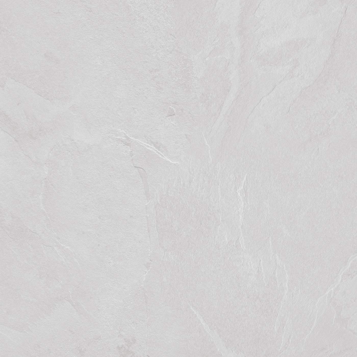 Image of A close-up of a light gray stone or marble-like surface with subtle natural veining and a matte texture.