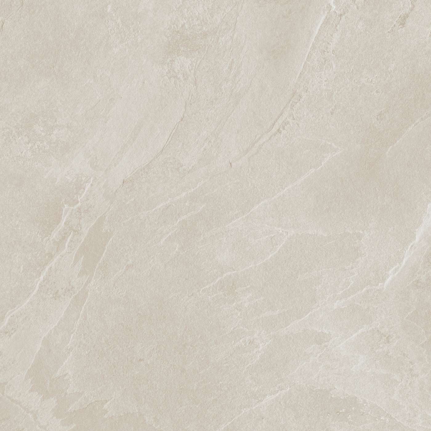 Image of A close-up of a light beige stone or marble surface with soft natural veining and a matte finish.