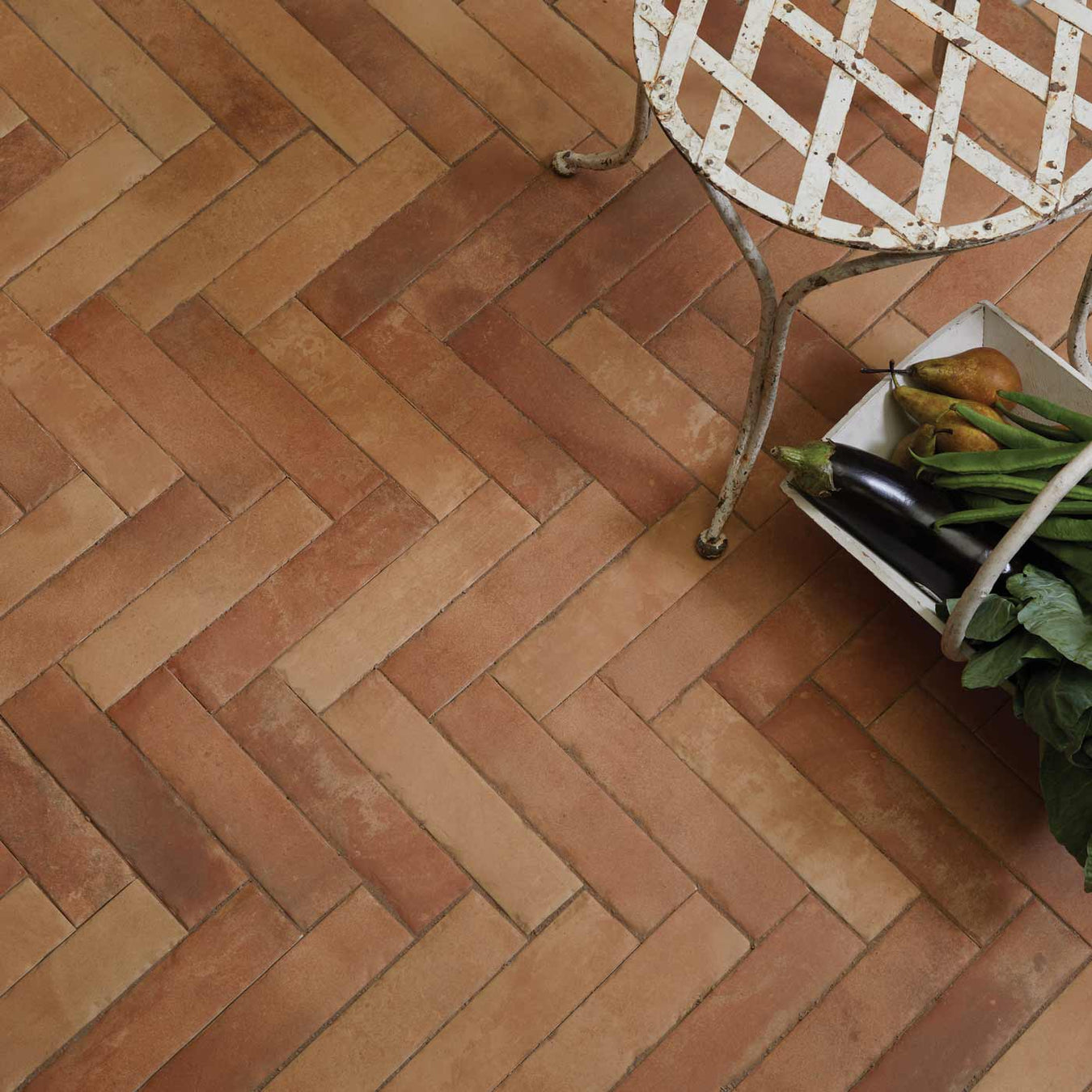 terracotta effect floor tile layed herringbone 