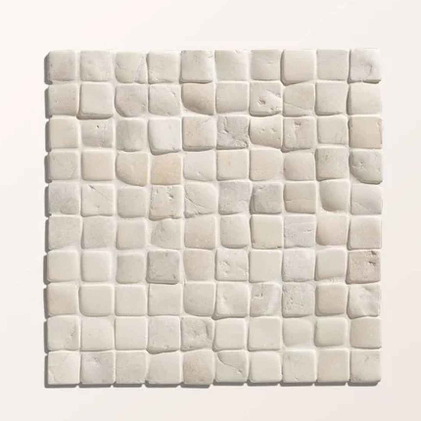 Image of A square sheet of textured mosaic tiles in a warm off-white or cream color, arranged in a grid pattern with a light beige background.