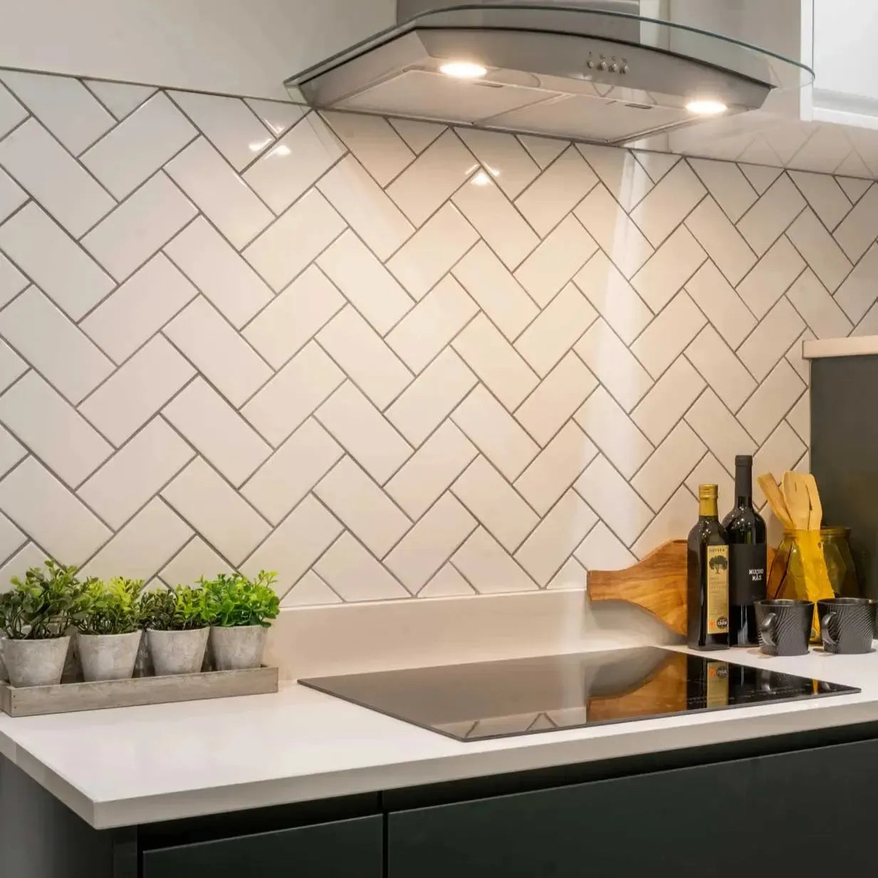 Image of Flat white wall tile as a kitchen splash back