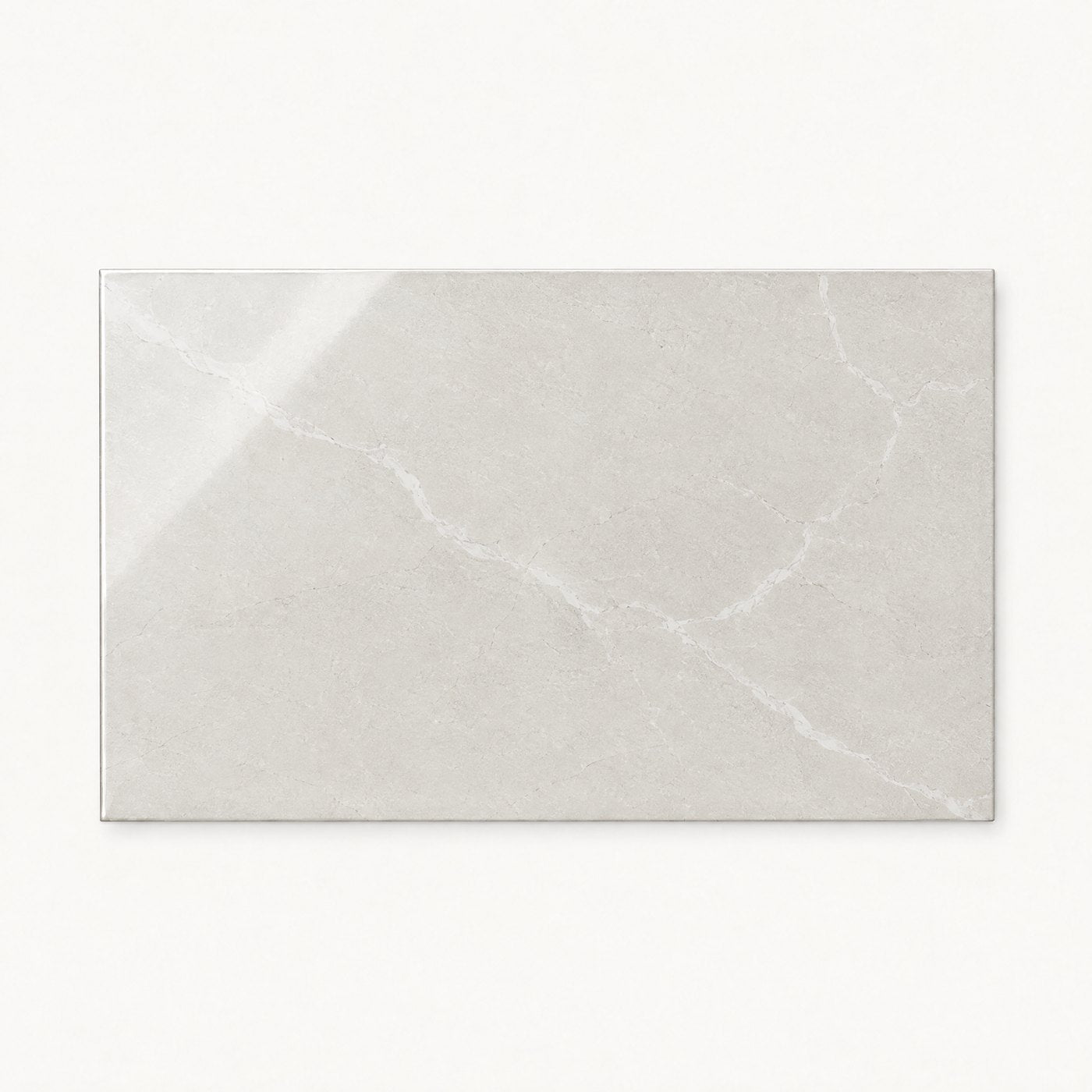 Image of A rectangular ceramic or porcelain tile with a light gray marble pattern, shown against a plain white background.