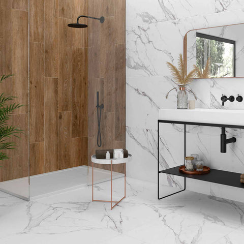 wood effect tile and marble effect tile in a bathroom wall and floor made of porcelain