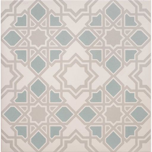Square tile with a geometric star and diamond pattern in soft teal and light grey on a cream background.”