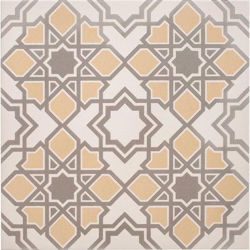 Square tile with a geometric star and diamond pattern in yellow and grey on a chalk‑coloured background