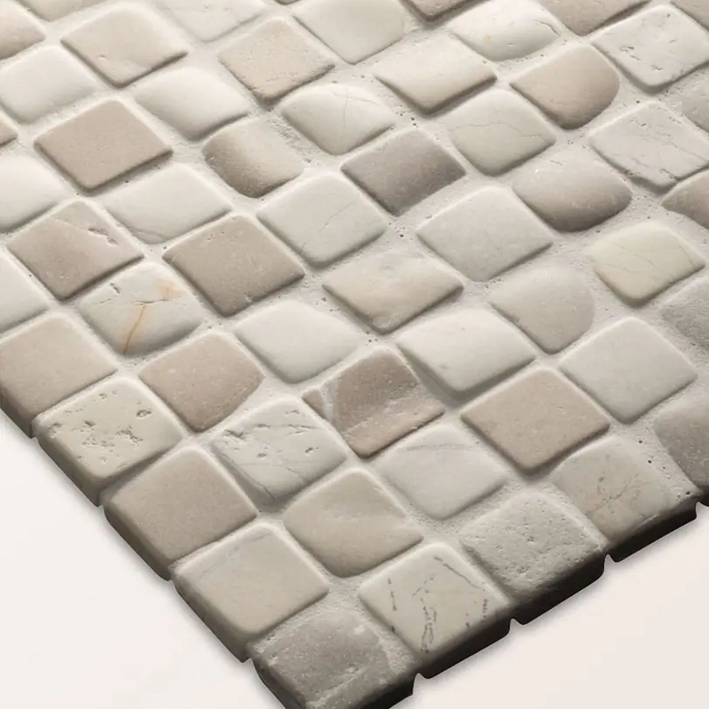 Image of Beige and off-white square mosaic tile sheet with a textured, raised-grid pattern, shown at an angle against a white background.