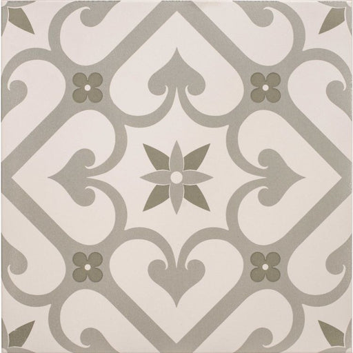 Square tile with a soft green and grey floral trellis pattern on a chalk‑coloured background