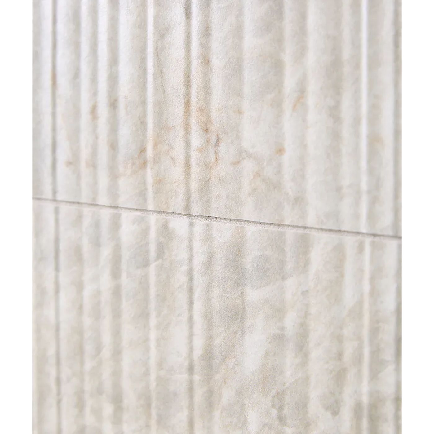 Image of Beige marble-look wall tiles with a fluted vertical texture and subtle warm gray veining.