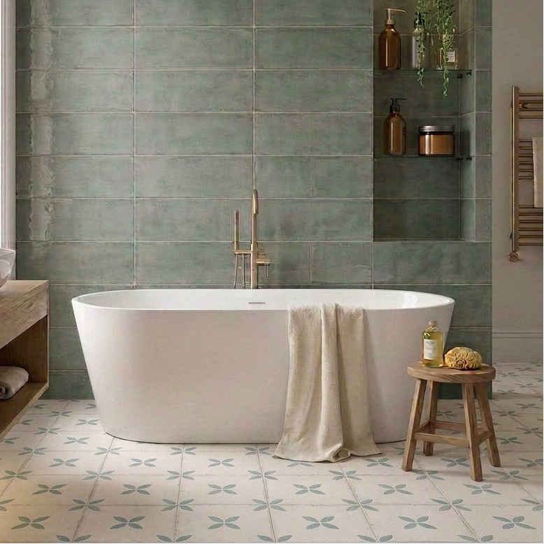 Image of Bathroom with Montblanc Sage wall tiles and Maria Green 25x25cm patterned floor tiles, warm ambient lighting and styled glass shelves.