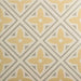 Patterned tile with yellow and gray design