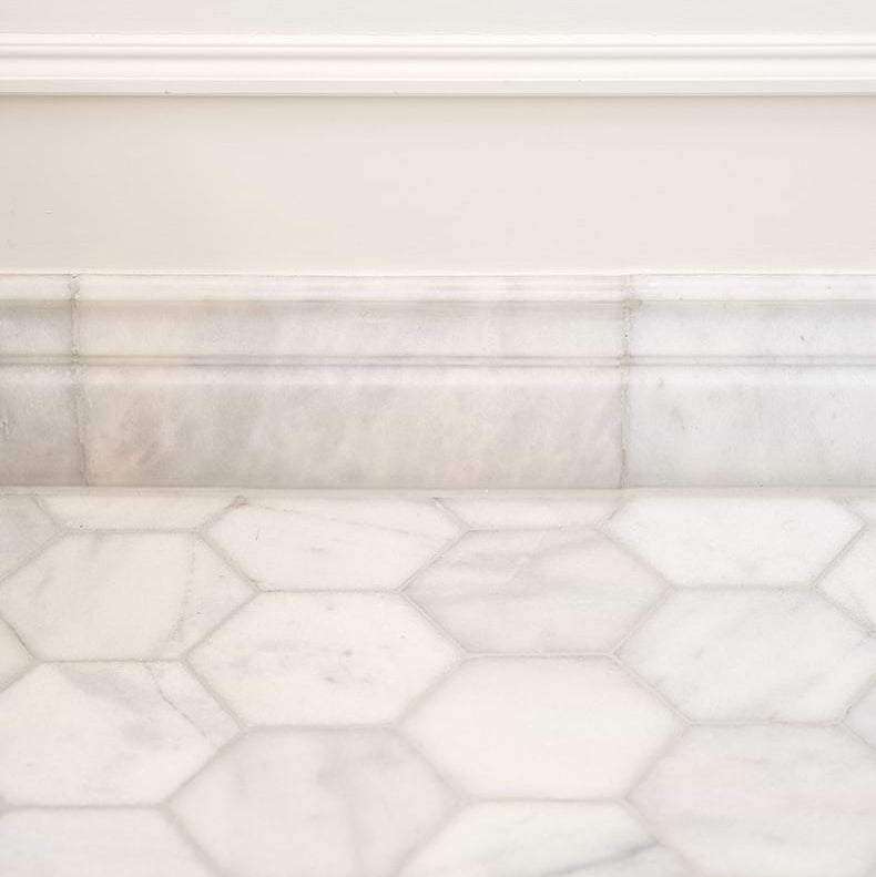 Image of Close-up of a marble backsplash with hexagonal pattern