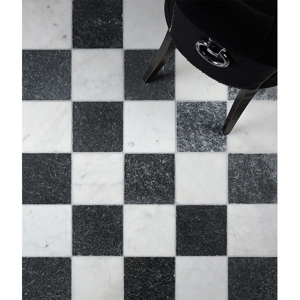 Image of Black chair on a checkered black and white floor