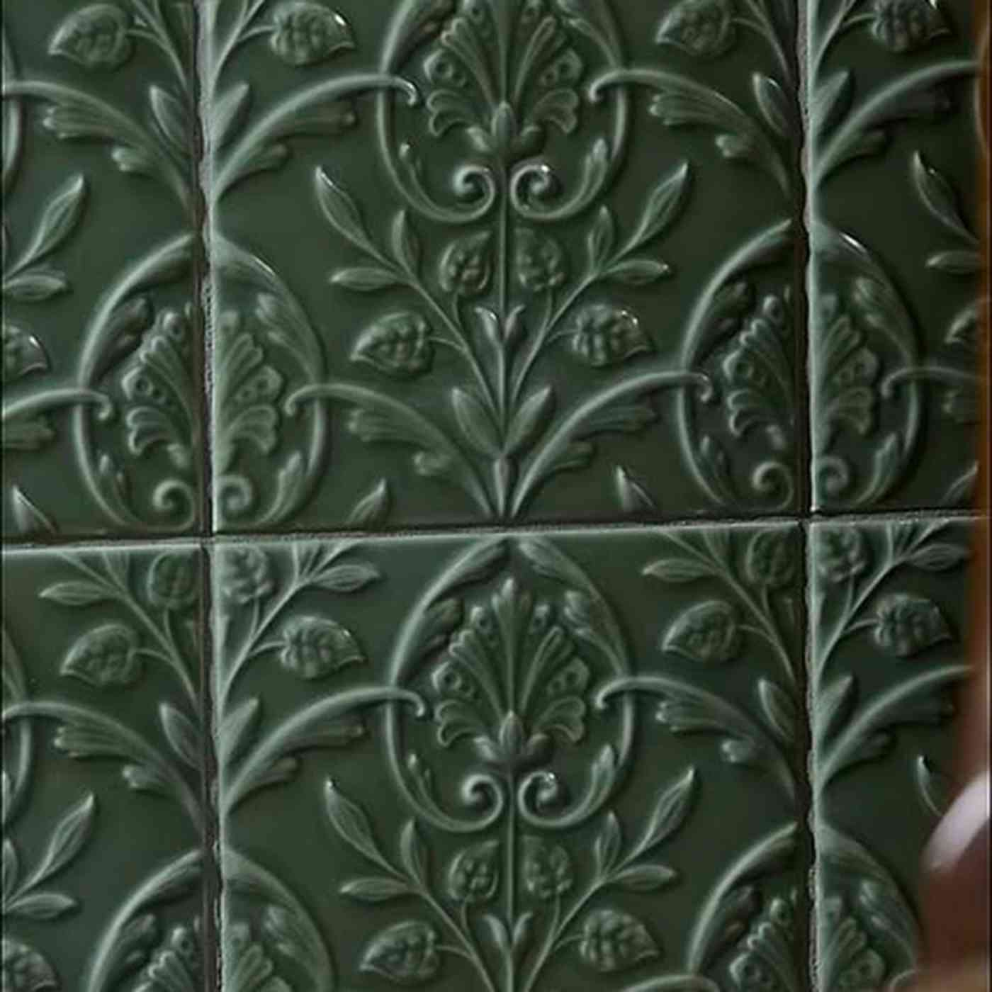 Image of Decorative green tiles with floral patterns