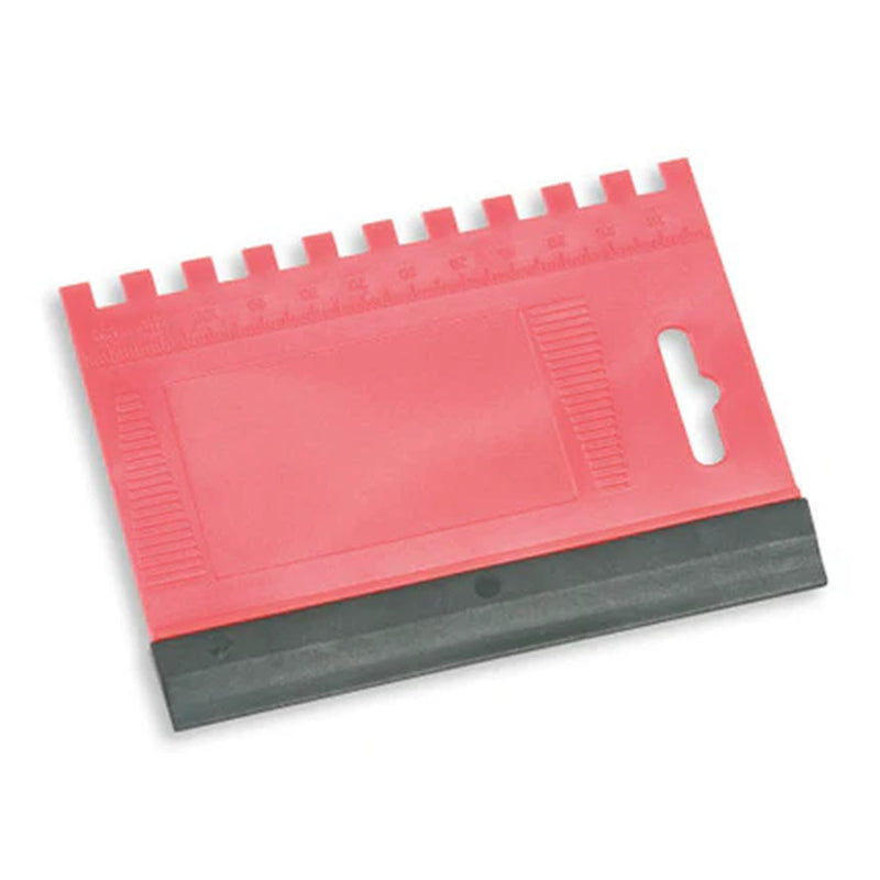 Image of Red plastic tool with a textured surface on a white background