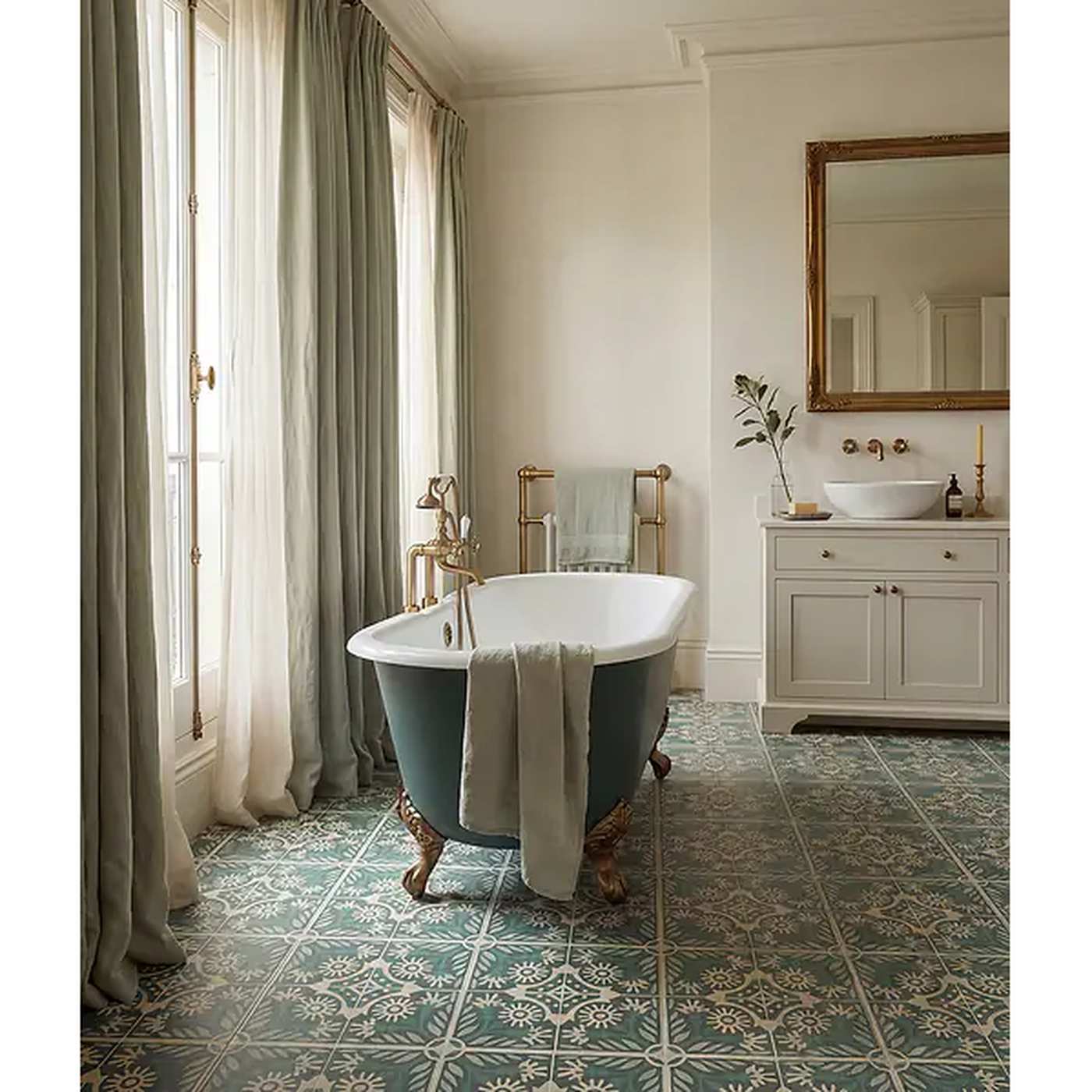 Image of Luxurious bathroom with freestanding bathtub, decorative tiles, and elegant fixtures.