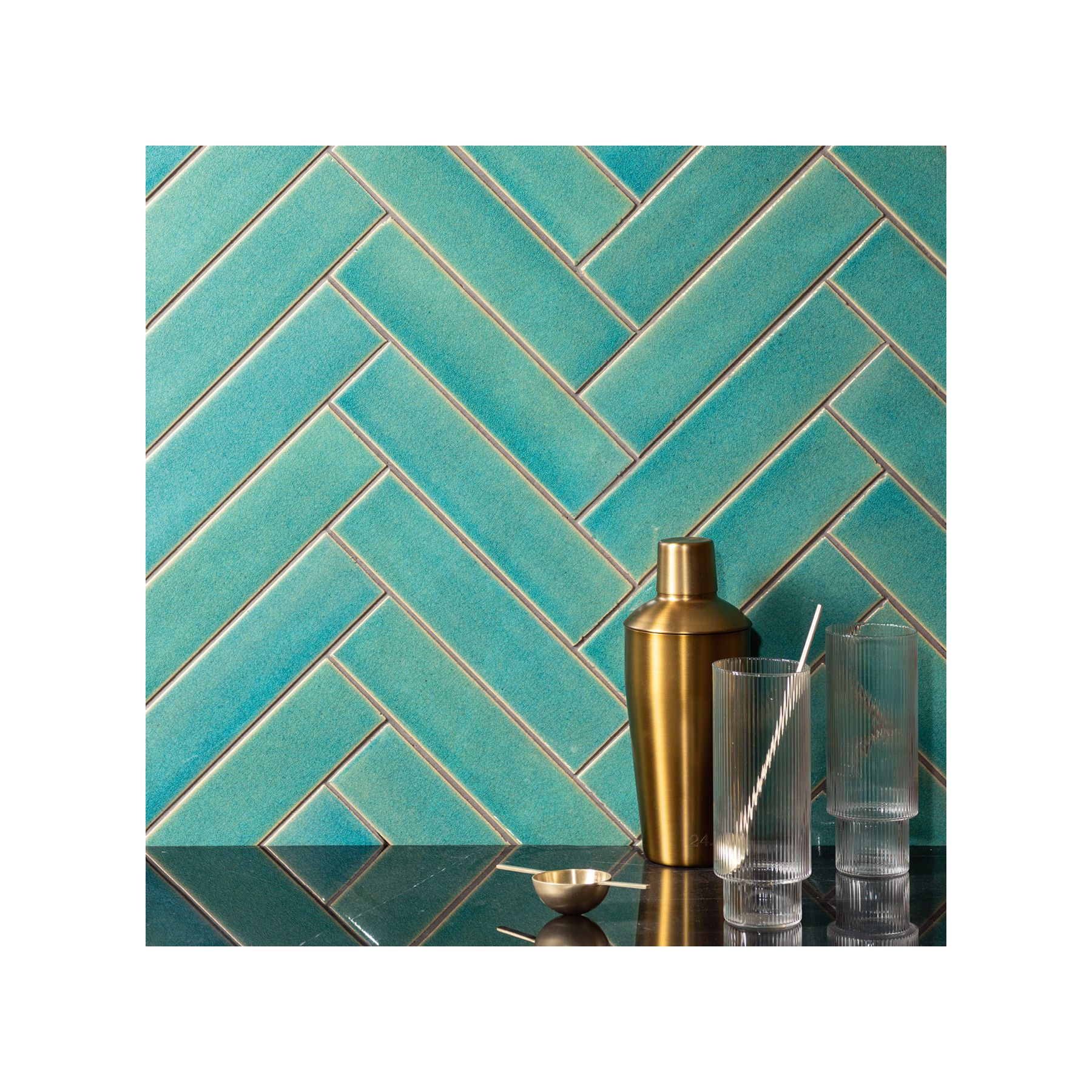 Image of reef green brick tiles as a kitchen splash back in herringbone lay out