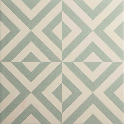Green and white tile with a geometric diamond pattern.