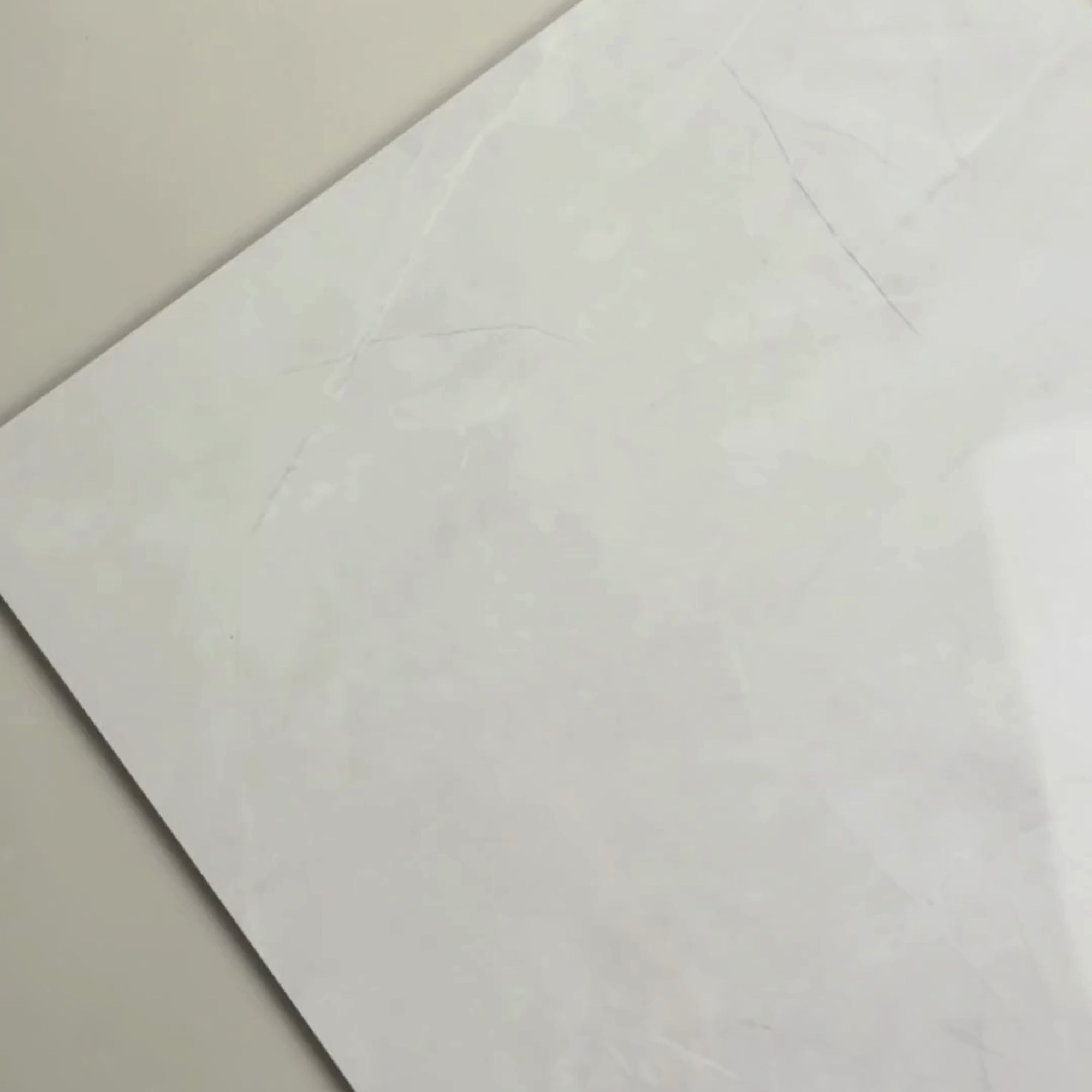 Image of Soft White Polished Porcelain tile 60x60cm